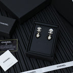 Chanel earrings set with heart charms and crystal drops in silver and black