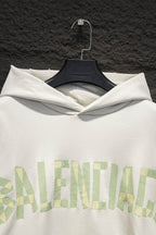 Off-white hoodie front with hood and large light-green logo print