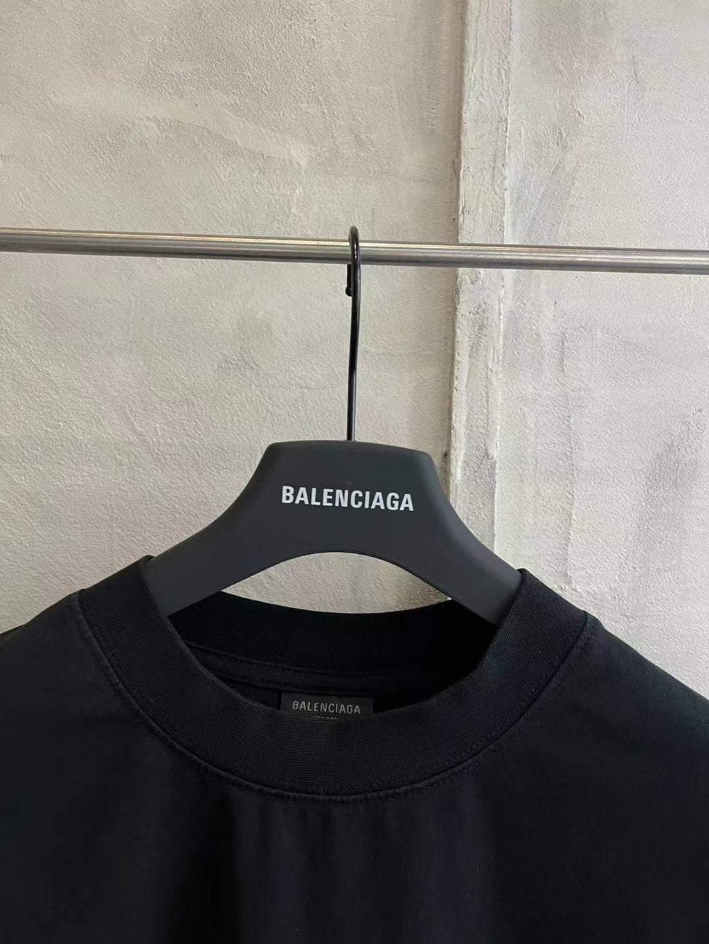 Black crew-neck T-shirt with Balenciaga neckline label