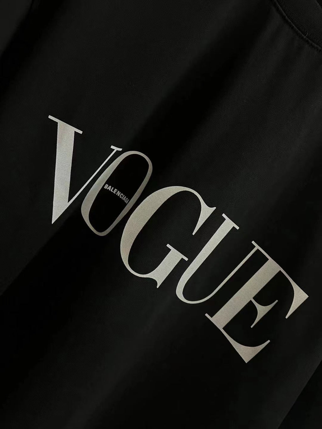 Black T-shirt with VOGUE lettering and small Balenciaga text