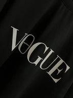 Black T-shirt with VOGUE lettering and small Balenciaga text