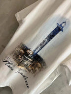 White T-shirt with blue tower and 'Place Vendome' script graphic.
