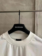 Balenciaga white crewneck T-shirt with small logo label at the neckline