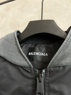 Dark hooded zip jacket with heather gray hood and BALENCIAGA logo patch
