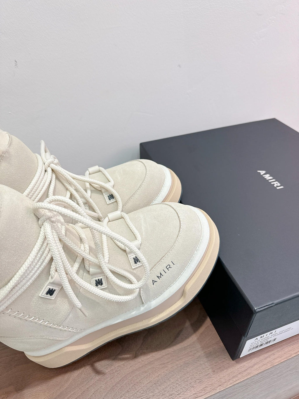 Amiri lace-up boots, light beige suede with stitched panels and logo eyelets