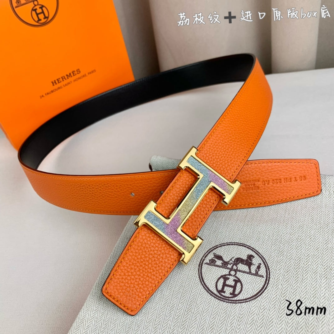 Orange leather belt with silver-tone H buckle and black inner strap