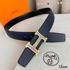 Navy leather belt with gold H buckle and side keeper strap