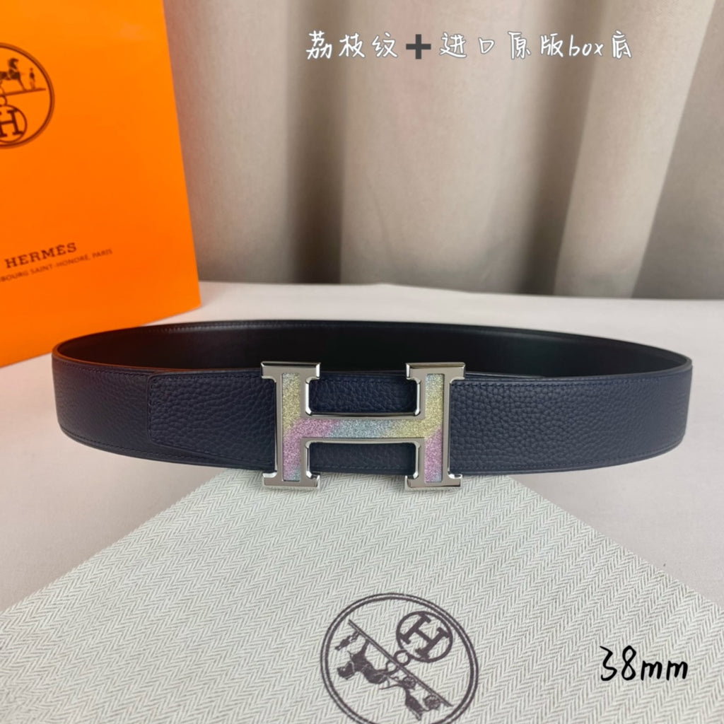 Navy leather belt with gold H buckle and enamel-accented frame
