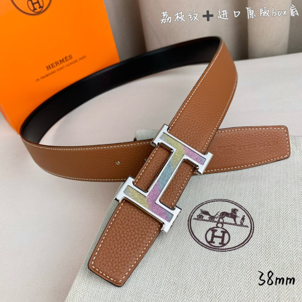 Tan leather belt with gold-tone and silver-tone H buckle and leather keeper