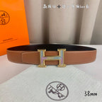 Brown leather belt with gold-tone H buckle and adjustable holes