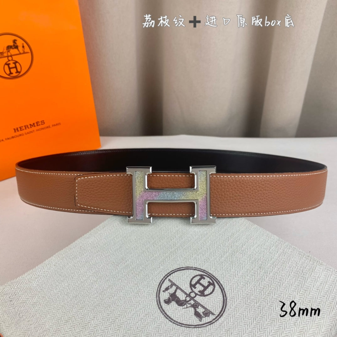 Brown leather belt with gold-tone H buckle and centered prong details