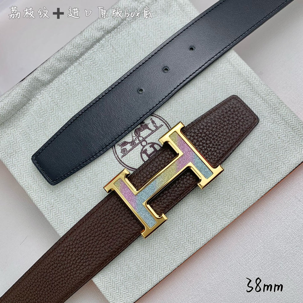Two-tone leather belt with gold H buckle, dark strap and brown keeper tab