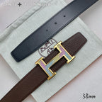 Two-tone leather belt with gold H buckle, dark strap and brown keeper tab