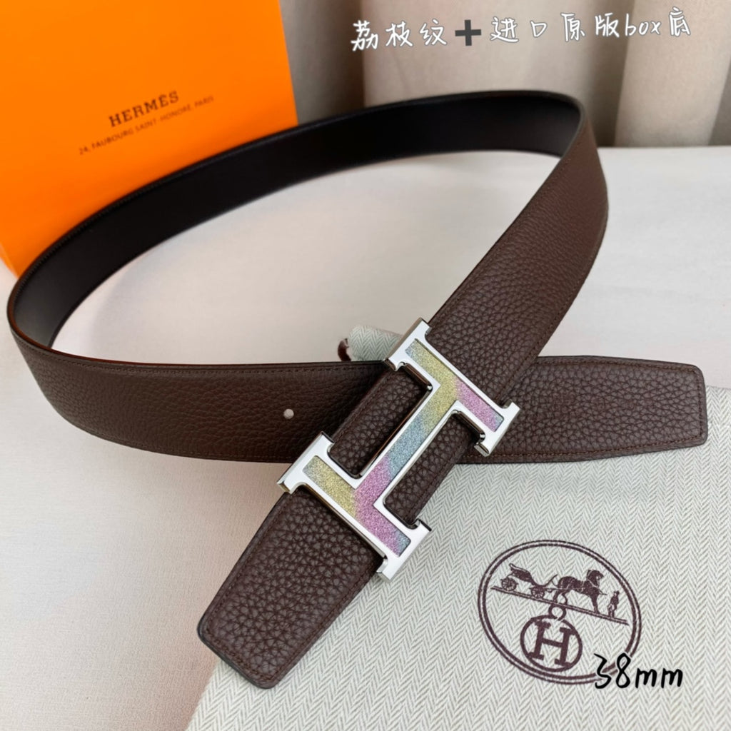 Brown leather belt with gold and silver H buckle and leather keeper strap