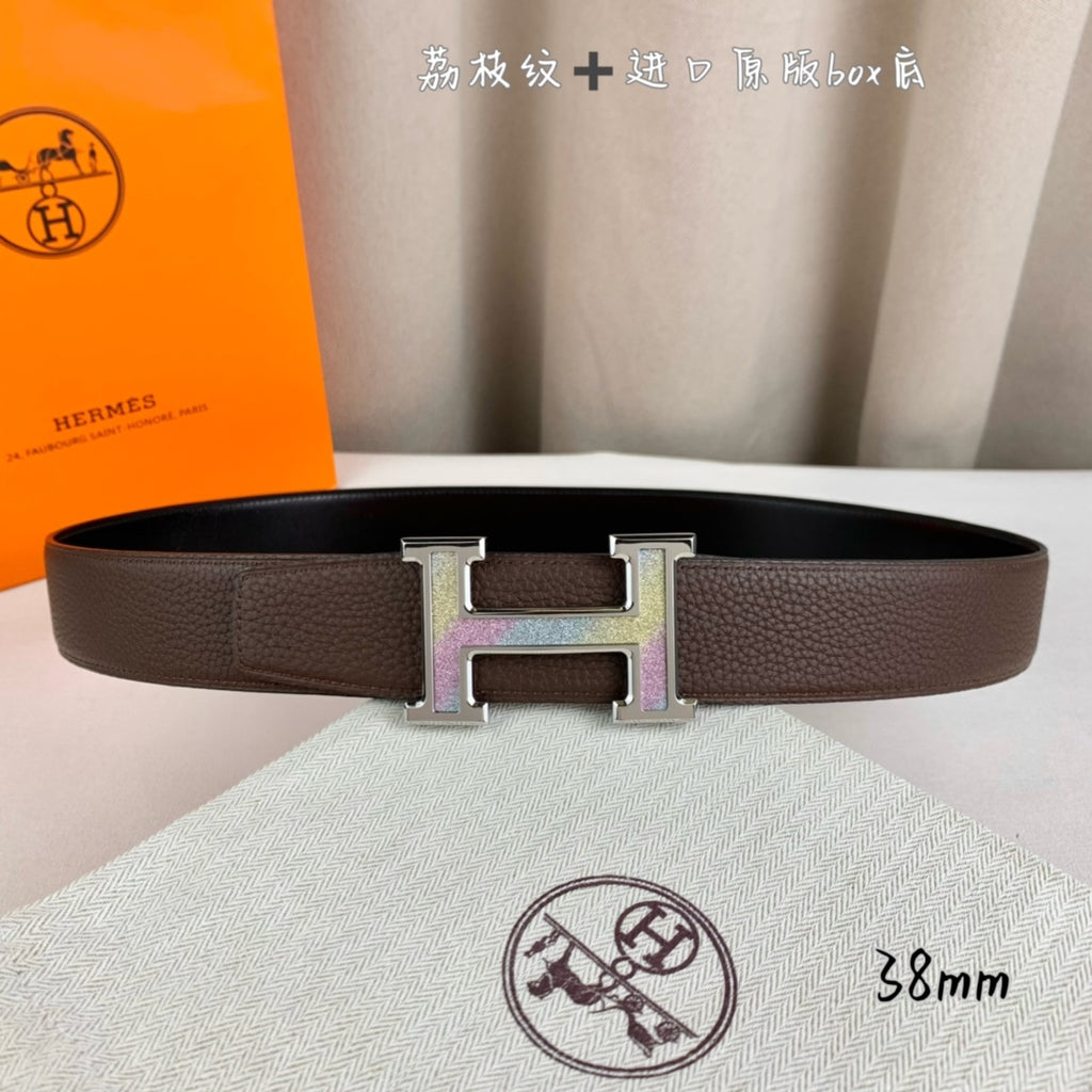 Brown leather belt with silver-toned hardware and gold H buckle