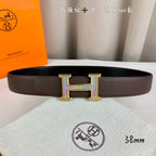 Brown leather belt with gold H buckle and leather keeper tab