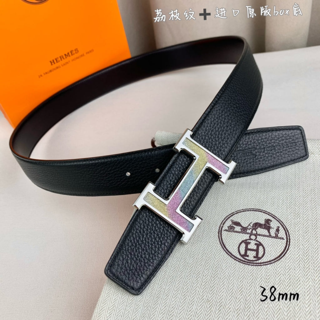 Leather belt with black strap and gold H buckle with purple inserts, end holes