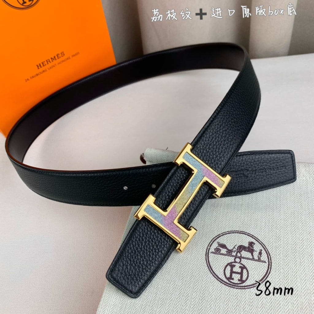 Leather belt with black textured strap and gold H buckle, purple trim detail