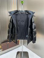 Prada long puffer jacket with hood, quilted front and visible interior lining