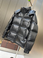Prada long hooded puffer jacket with side sleeves and dark quilted padding