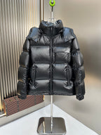 Prada long puffer jacket with hood, dark finish, front zipper and padded pockets