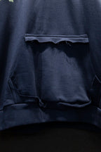 Balenciaga hoodie front pocket detail with distressed opening