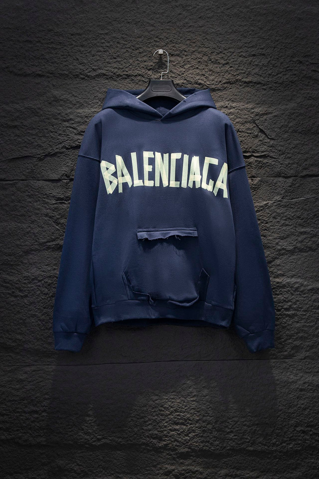 Balenciaga long-sleeve hoodie in dark blue with large white logo on chest
