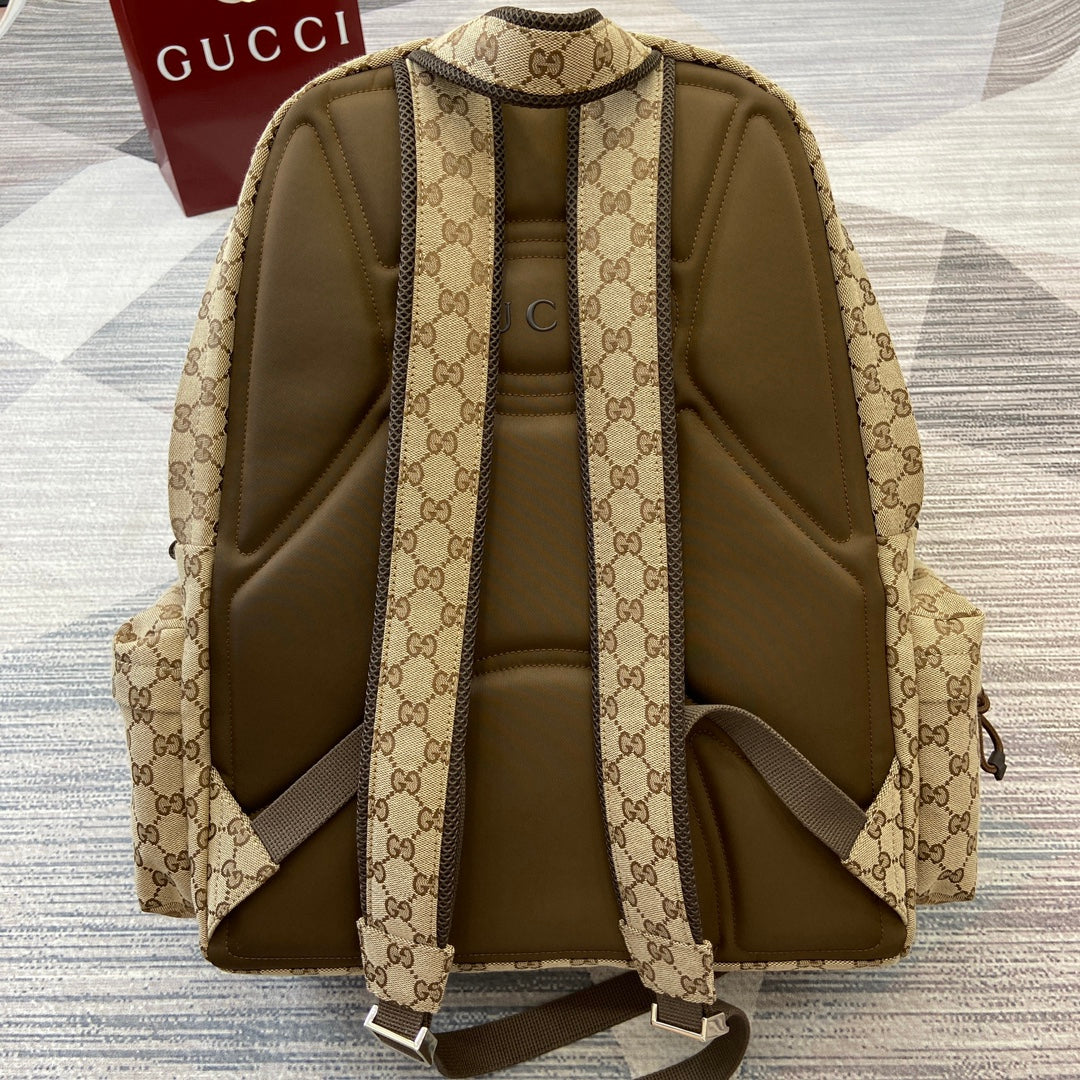 Gucci GG monogram backpack back panel with adjustable straps and zip closure