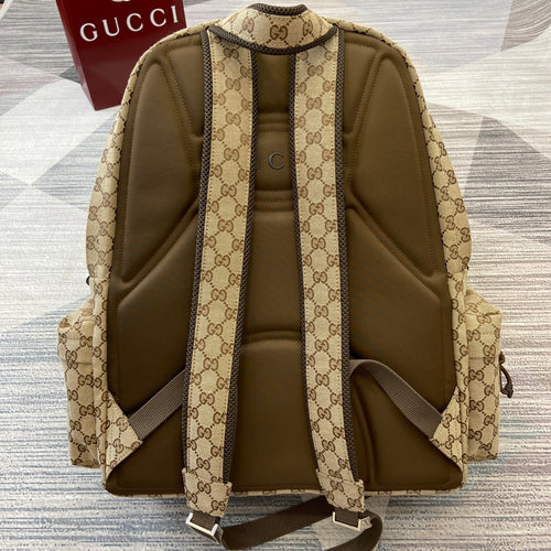 Gucci GG monogram backpack back panel with adjustable straps and zip closure