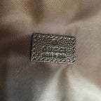Gucci men’s bag, black leather logo patch on fabric exterior