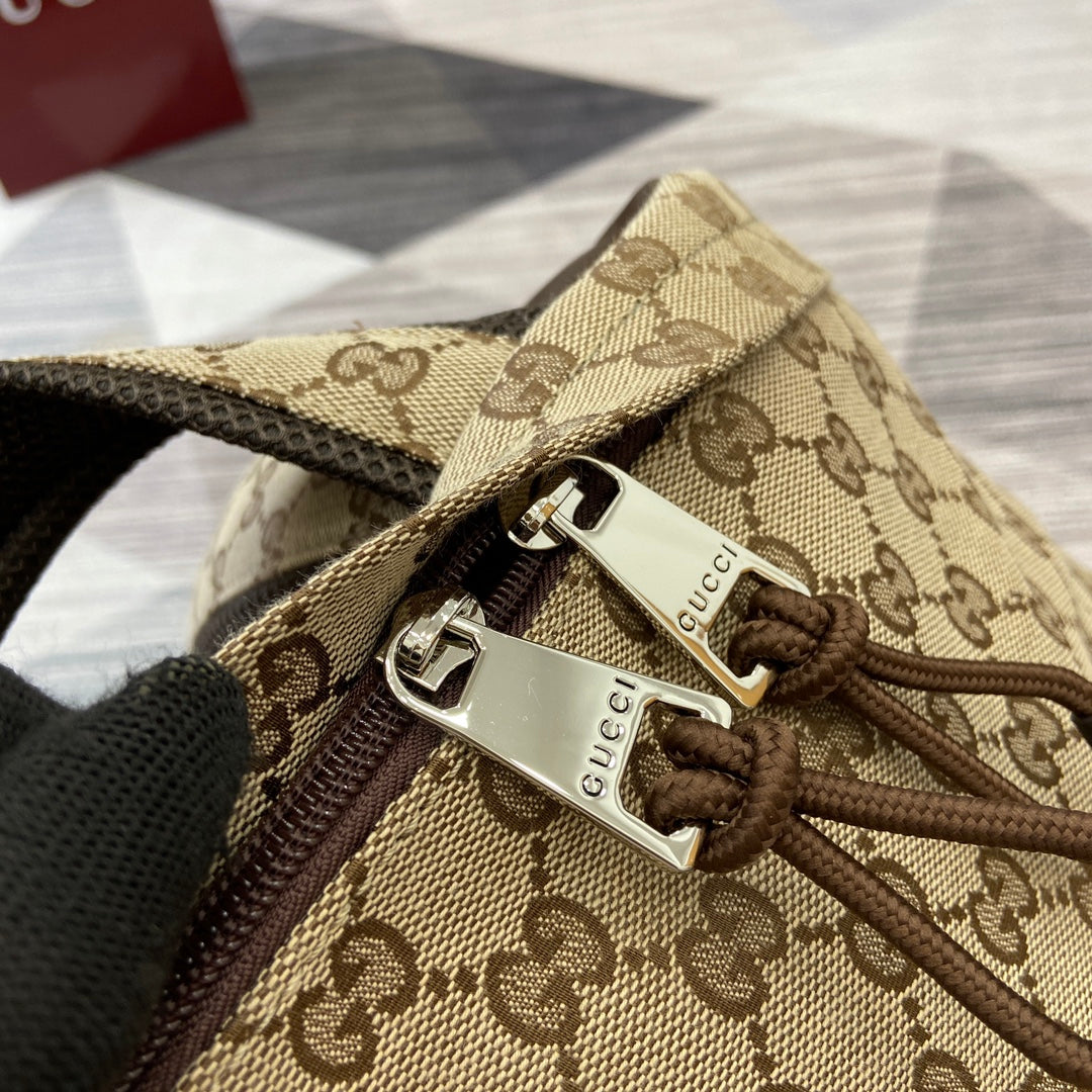 Gucci GG monogram backpack top with braided cords and silver buckles