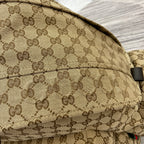 Gucci men’s bag, tan GG monogram canvas with stitched panel detail