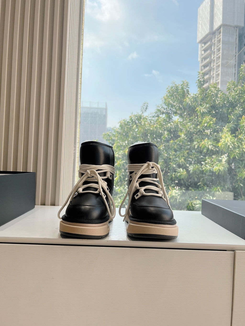 Amiri black high-top sneakers with cream laces and beige rubber sole