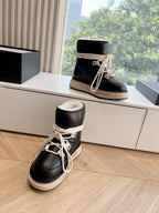 Amiri black high-top sneakers with cream laces, fur-lined collar, beige sole