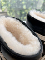 Amiri black high-top sneaker cuff with cream shearling lining detail