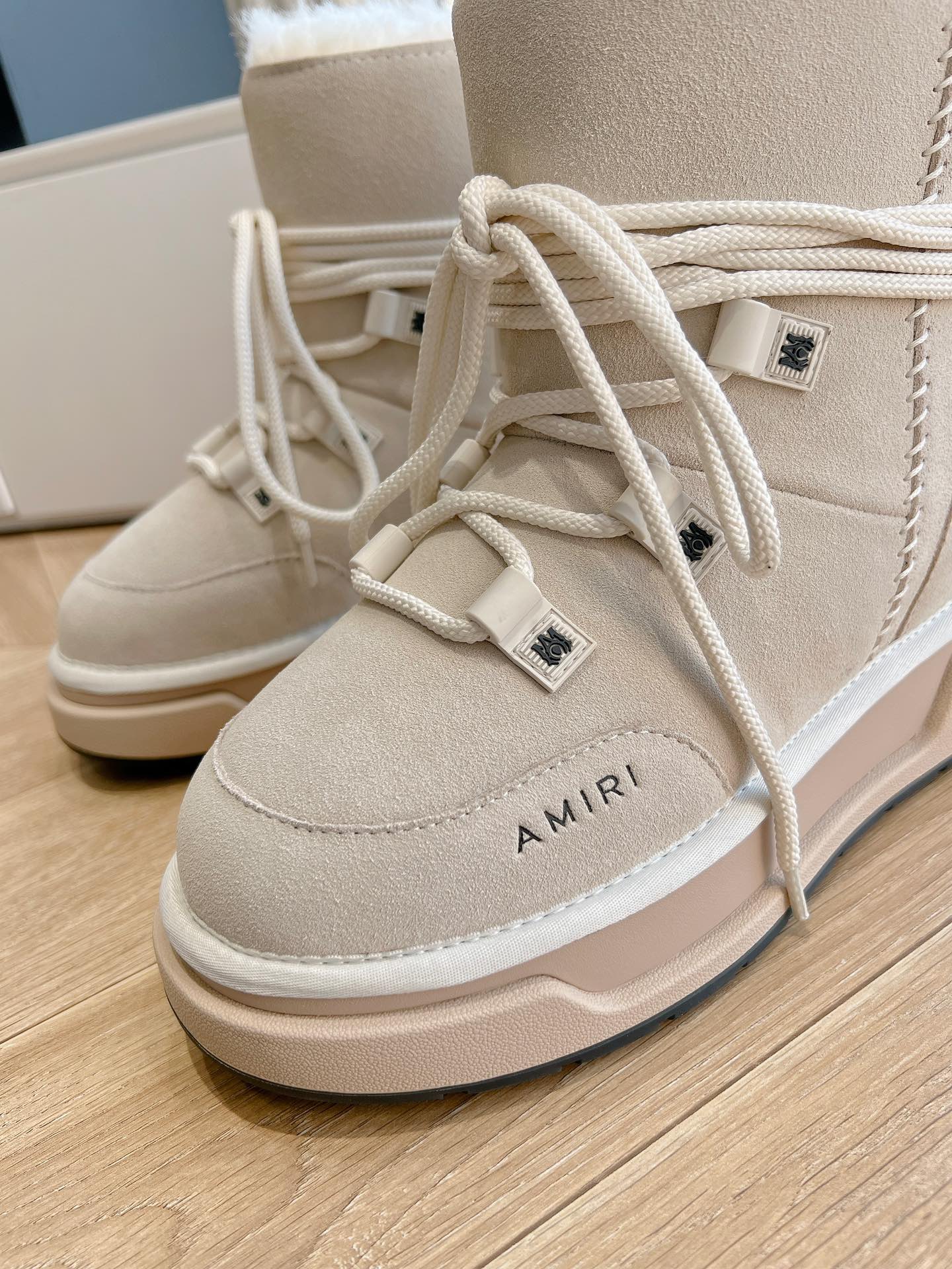 Beige lace-up boots with stitched logo AMIRI on front and side tag