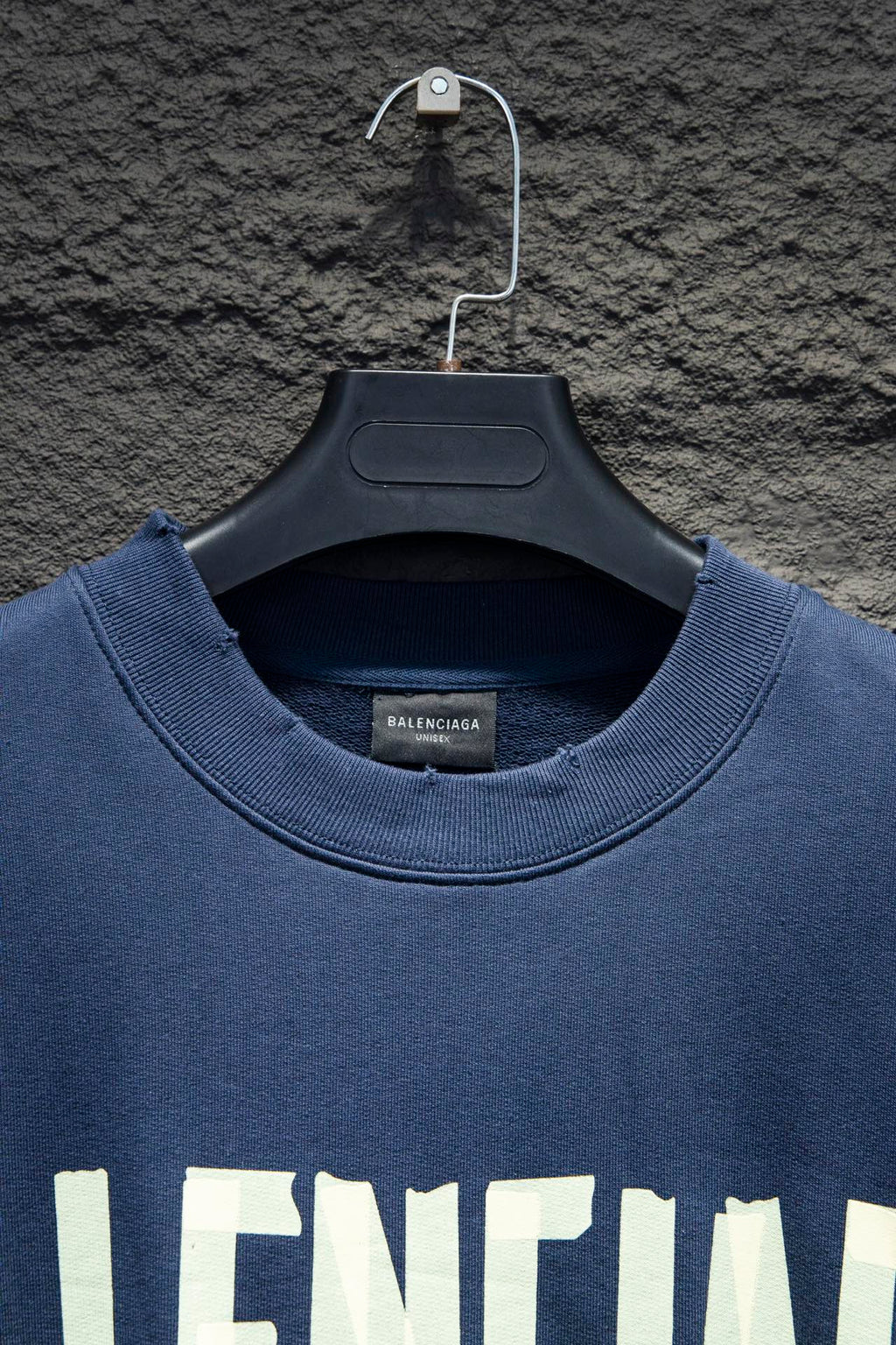 Blue sweatshirt neckline and crew collar with hang tag