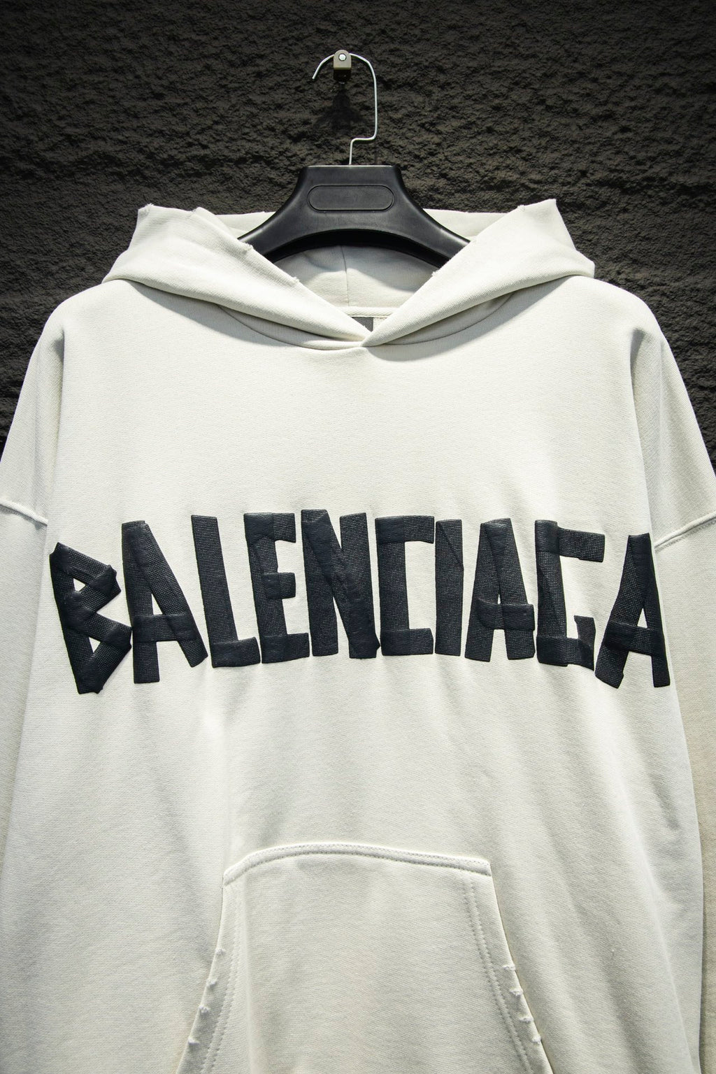 White Balenciaga hoodie with front logo lettering and front kangaroo pocket