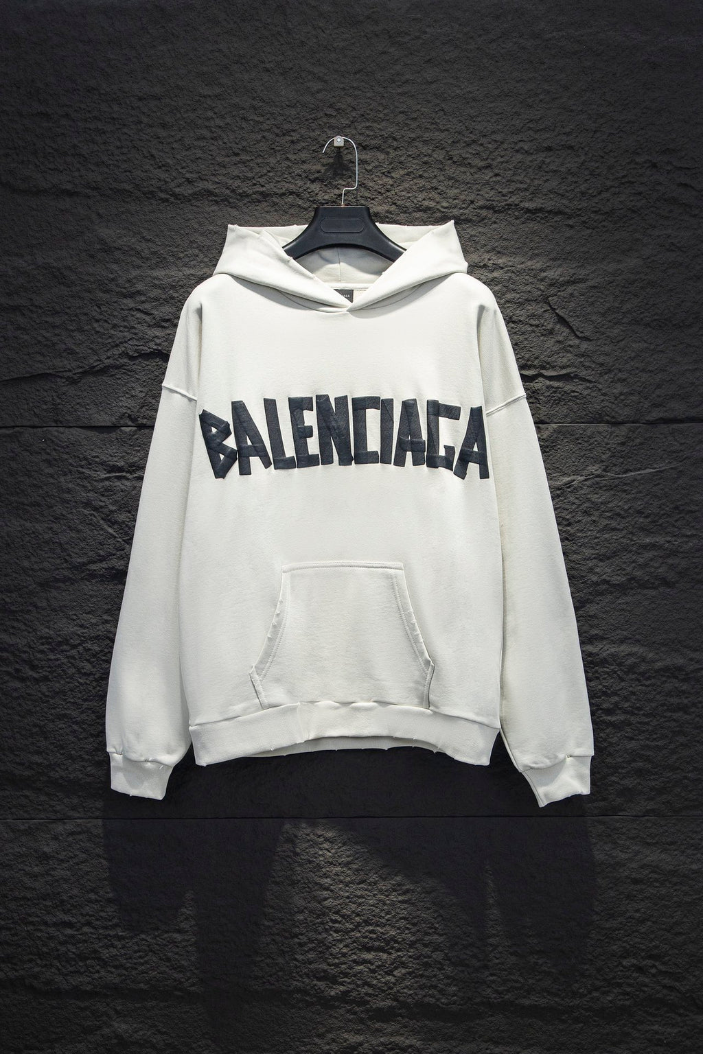 White Balenciaga long-sleeve hoodie with large front logo and front pocket