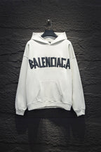 White Balenciaga long-sleeve hoodie with large front logo and front pocket