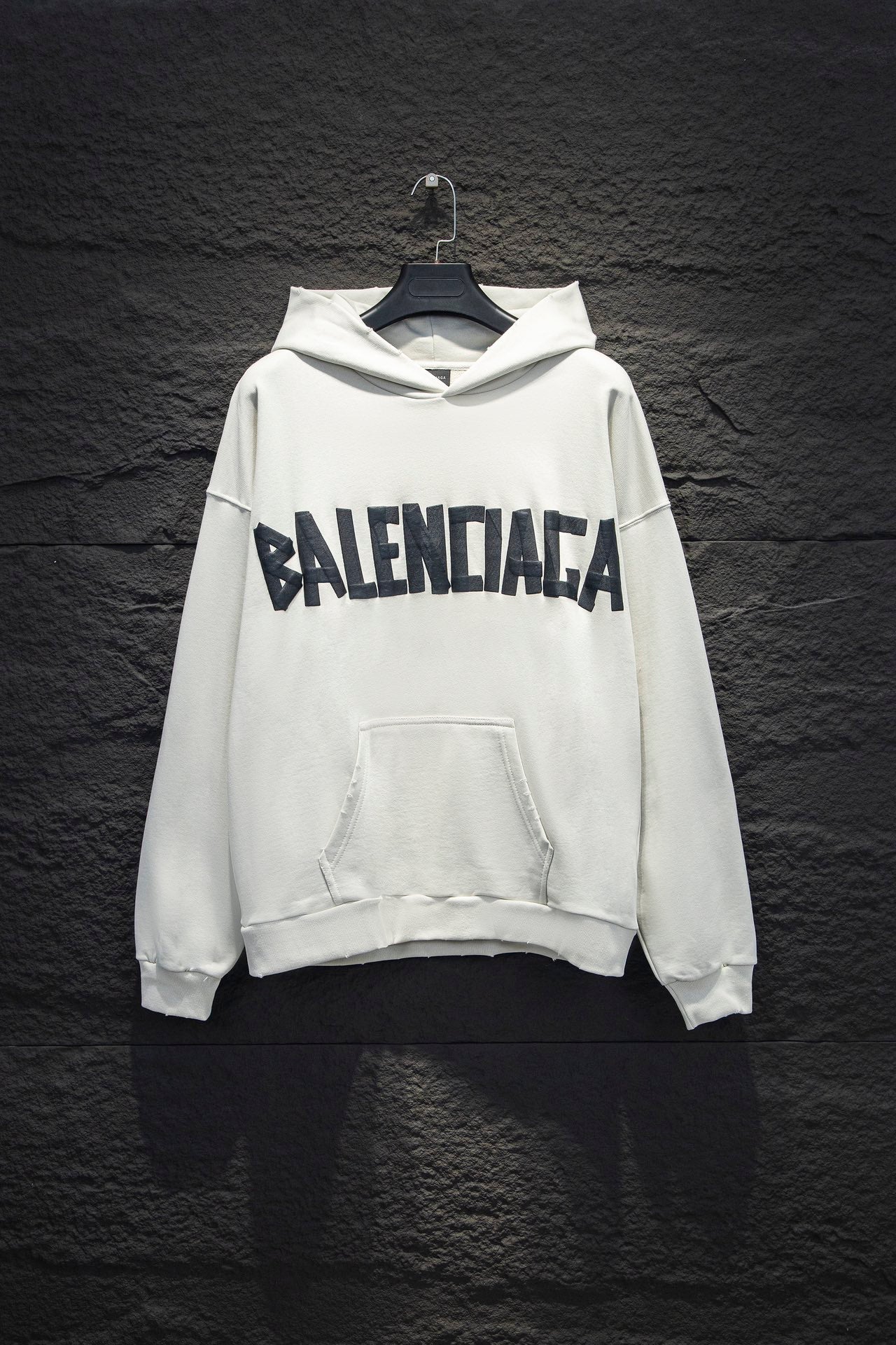 White Balenciaga long-sleeve hoodie with large front logo and front pocket