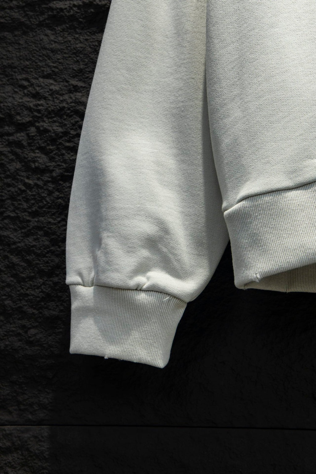 White hoodie sleeve cuffs and hem with ribbed knit detailing