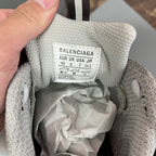Gray sneaker interior label with Balenciaga branding and size details
