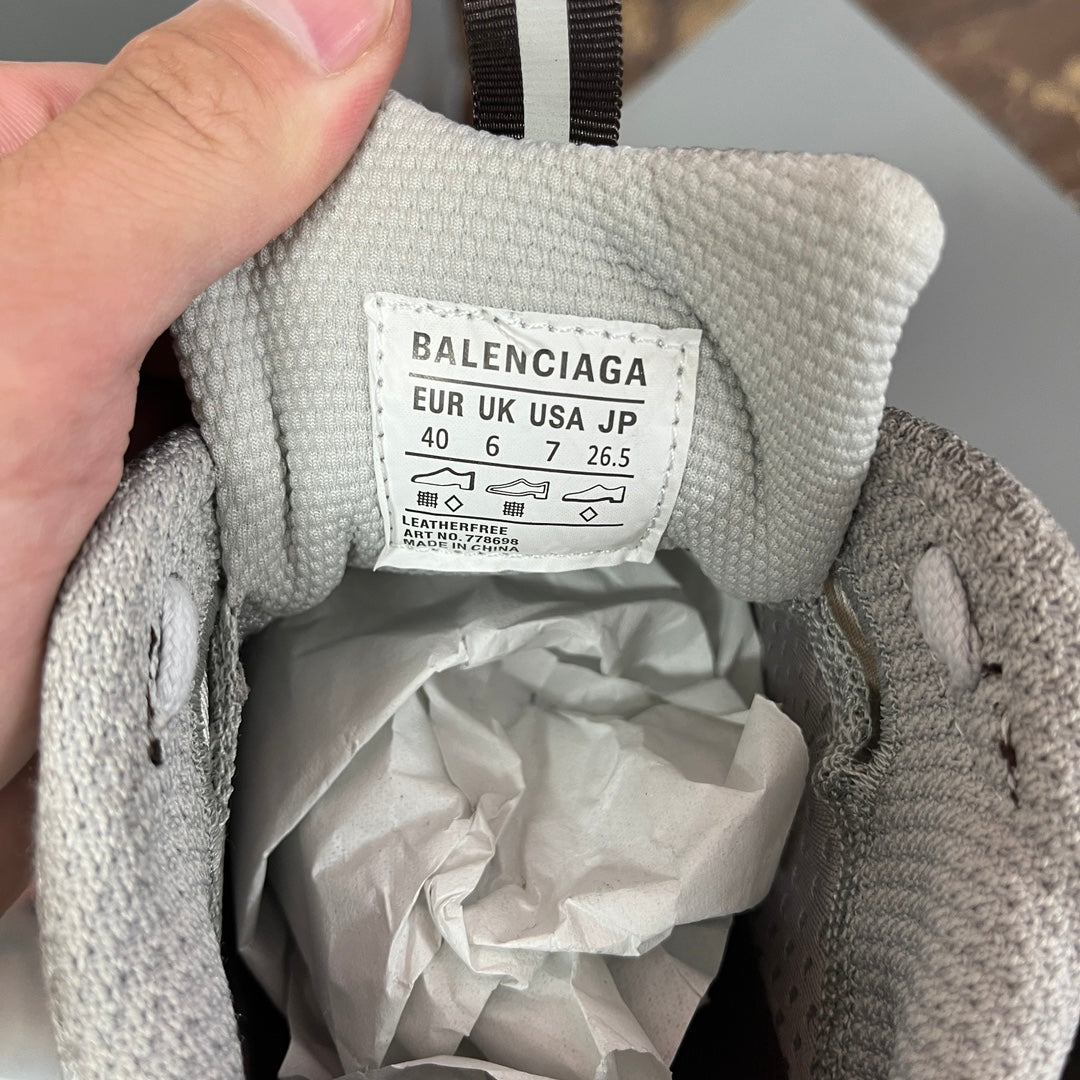 Gray sneaker interior label with Balenciaga branding and size details