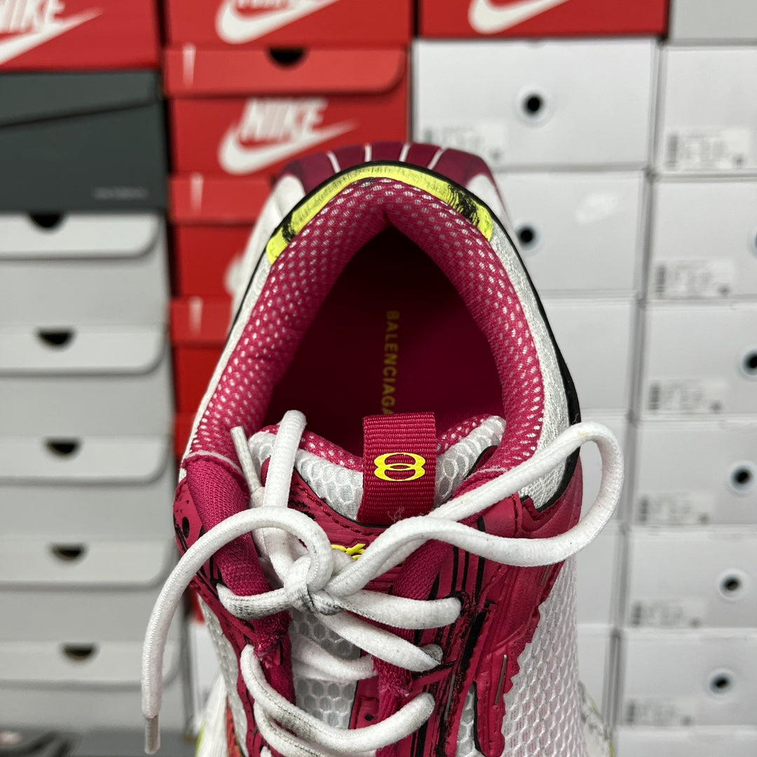 Maroon mesh sneaker collar with white laces and interior text detail
