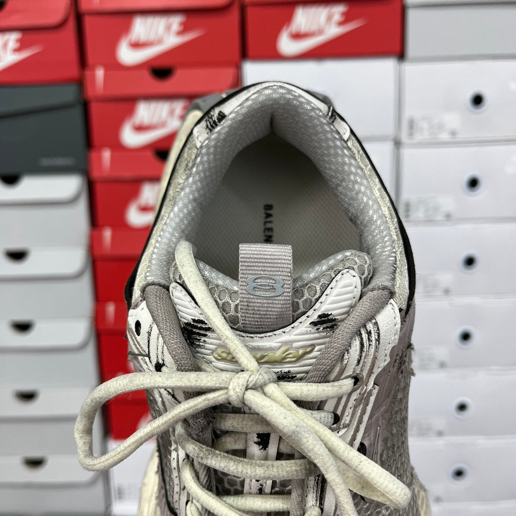 Balenciaga unisex running shoes, interior heel view with gray lining and lace-up opening