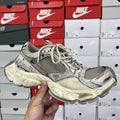 Balenciaga unisex running shoes with gray mesh upper, lace-up front, off-white sole