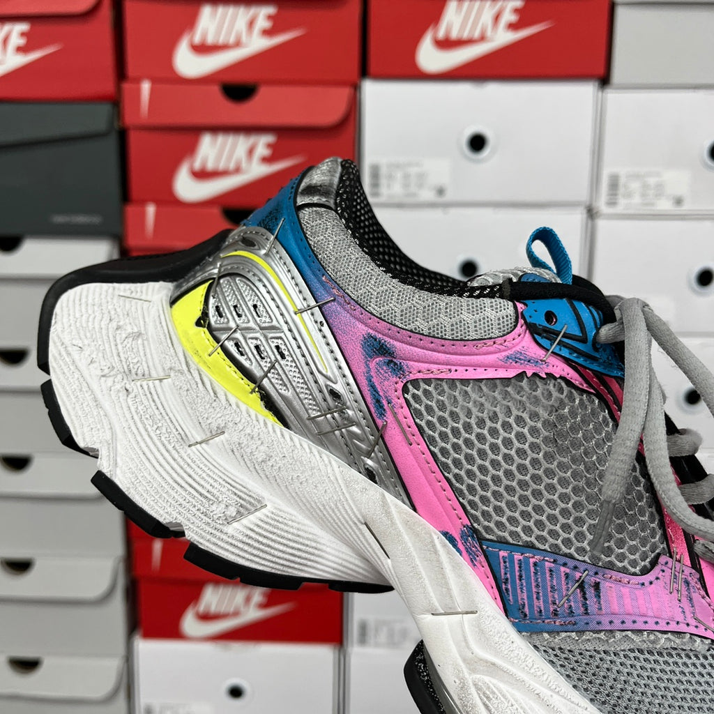 Unisex running shoe, grey mesh with pink, blue and neon yellow accents, lace-up.