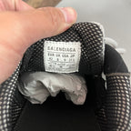 Unisex shoe size label, 'BALENCIAGA' and 'EUR UK JP 42 8 9 27.5' on black lining.
