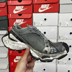 Unisex Balenciaga running shoe, side view of dark gray mesh with silver midfoot detailing